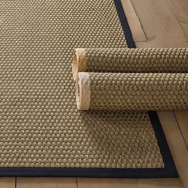 Basketweave sisal rug with wide black border