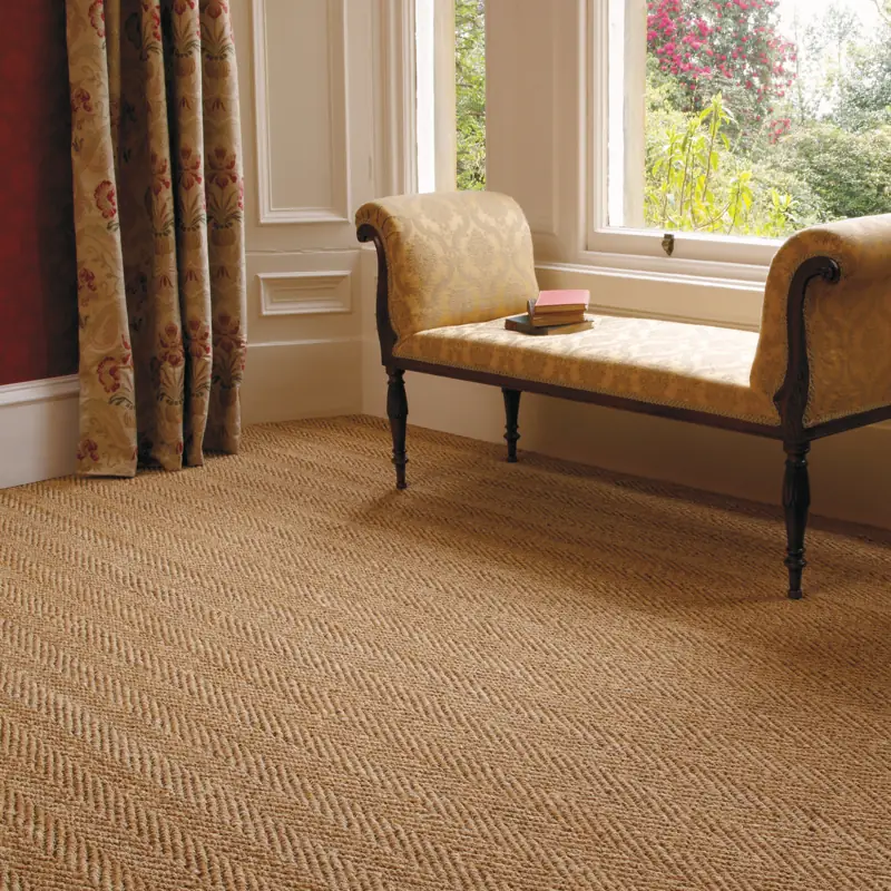 Herringbone sisal carpet in a classic room.