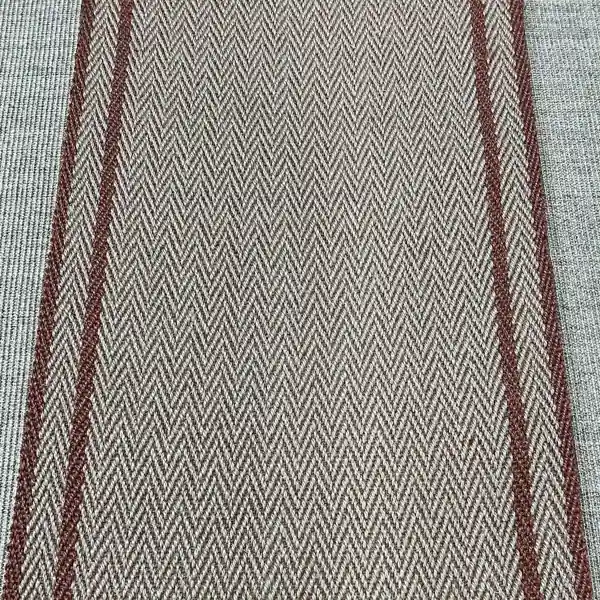 Herringbone sisal runner with red stripes.
